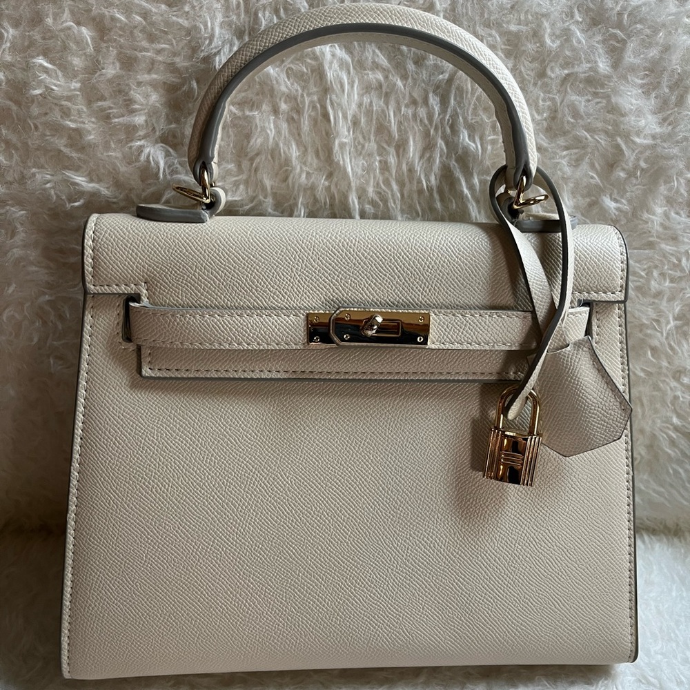 Classic cream handbag with gold hardware